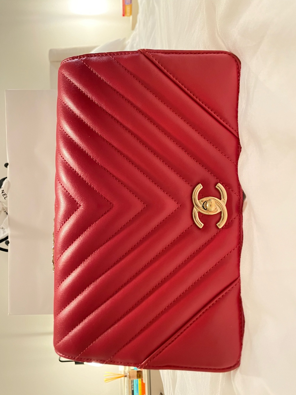 CHANEL Red Quilted Chevron Shoulder Bag with Gold CC Lock